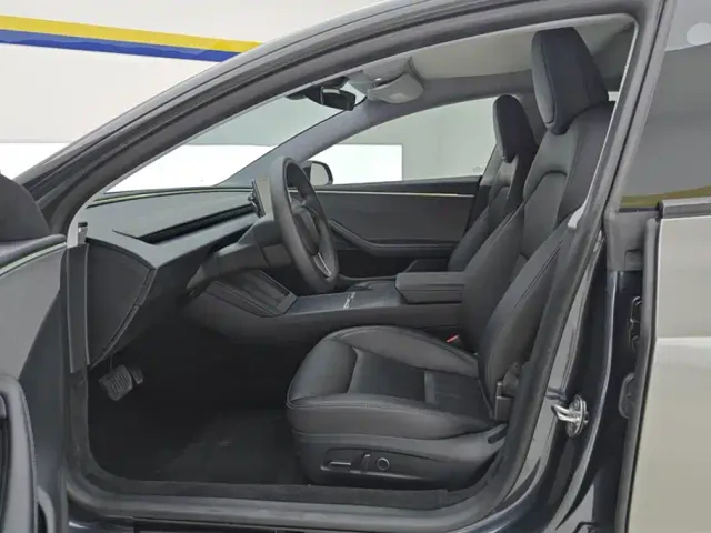 Tesla Model 3 — Фото автомобиля 9