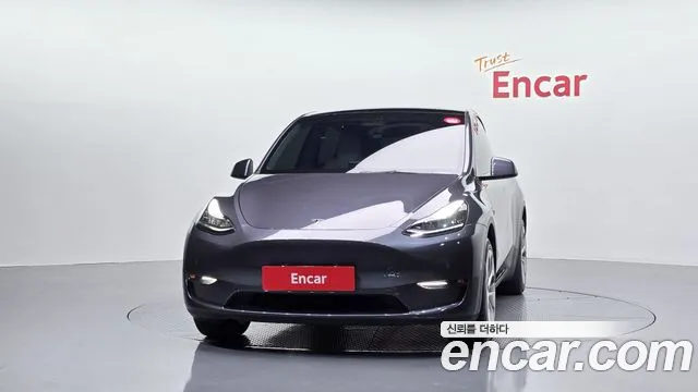Tesla Model Y — Фото автомобиля 3