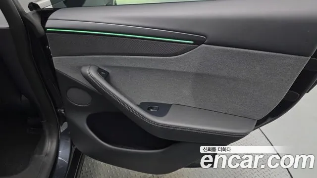 Tesla Model Y — Фото автомобиля 14