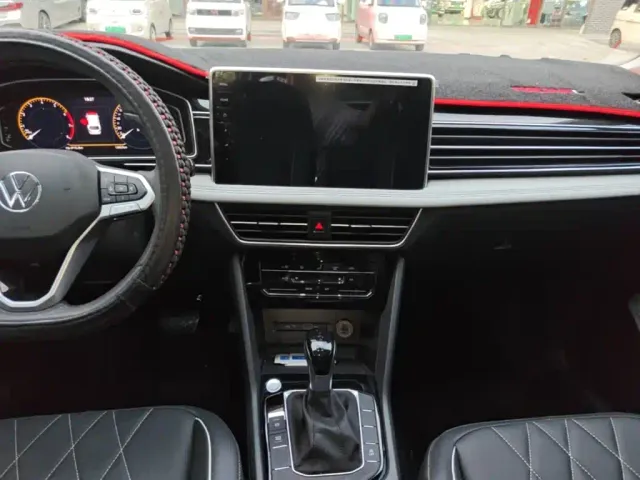 Volkswagen Tiguan L — Фото автомобиля 12