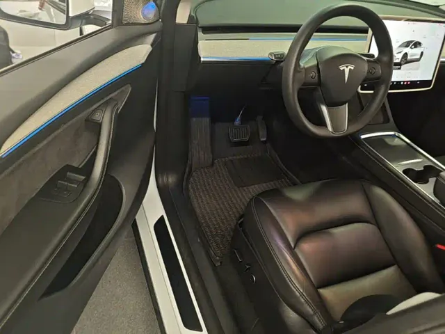 Tesla Model Y — Фото автомобиля 15