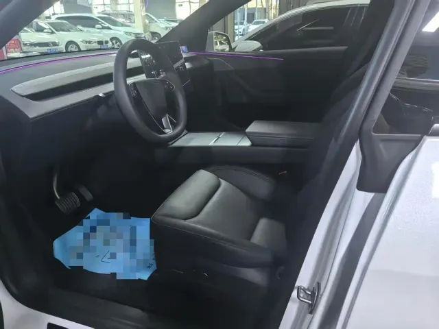 Tesla Model Y — Фото автомобиля 5