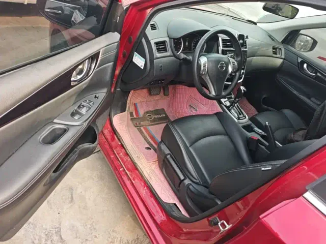 Nissan Tiida — Фото автомобиля 15