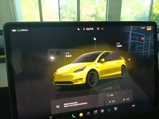 Tesla Model Y — Фото автомобиля 12