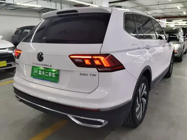 Volkswagen Tiguan L — Фото автомобиля 6