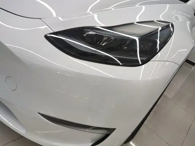 Tesla Model Y — Фото автомобиля 23
