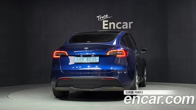 Tesla Model Y — Фото автомобиля 4
