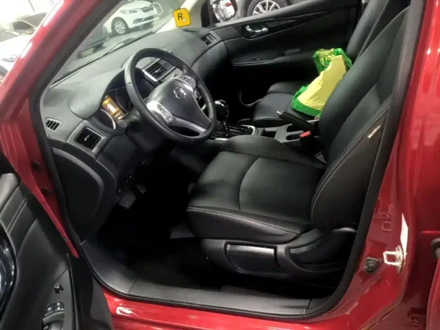 Nissan Tiida — Фото автомобиля 14