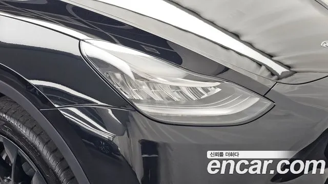 Tesla Model Y — Фото автомобиля 7