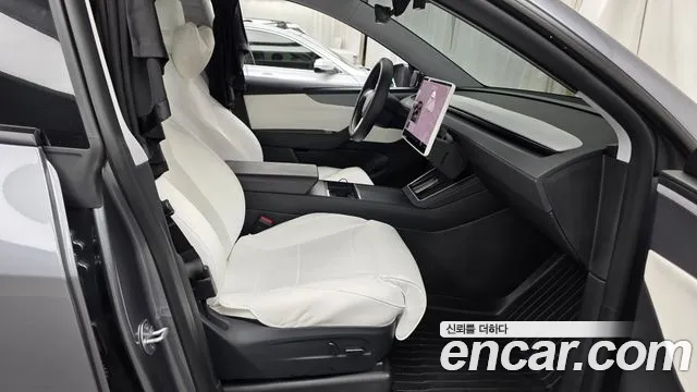 Tesla Model Y — Фото автомобиля 16