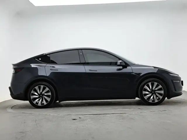 Tesla Model Y — Фото автомобиля 5