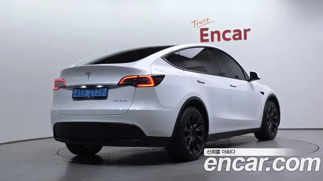 Tesla Model Y — Фото автомобиля 2