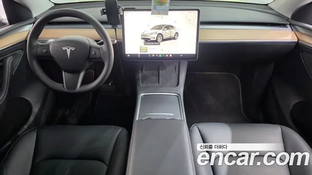 Tesla Model Y — Фото автомобиля 7