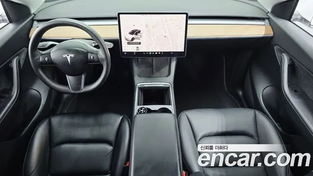 Tesla Model Y — Фото автомобиля 10