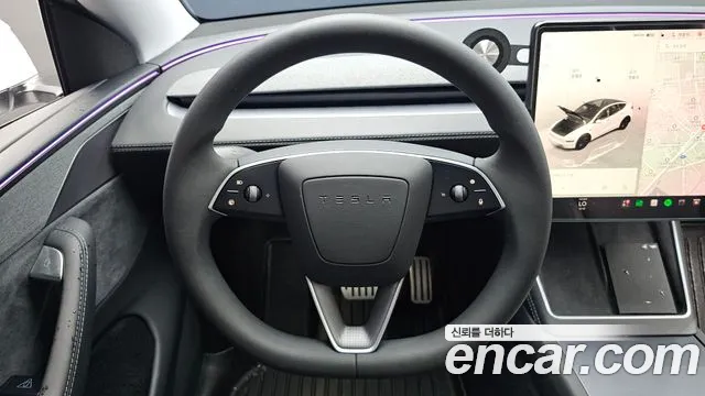 Tesla Model Y — Фото автомобиля 11