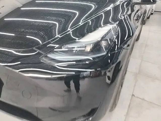 Tesla Model Y — Фото автомобиля 23