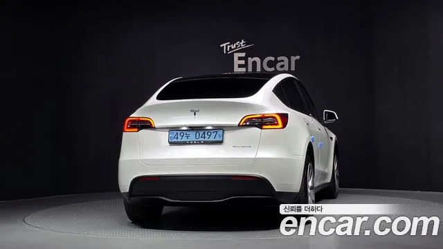 Tesla Model Y — Фото автомобиля 4