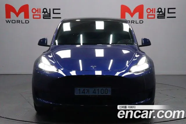 Tesla Model Y — Фото автомобиля 3