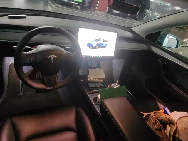 Tesla Model Y — Фото автомобиля 12