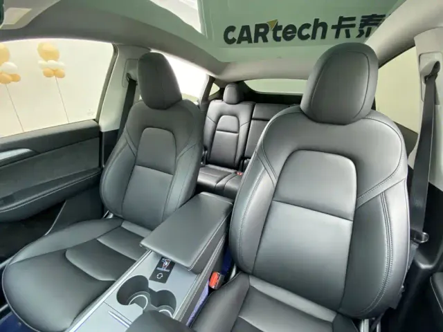 Tesla Model Y — Фото автомобиля 26