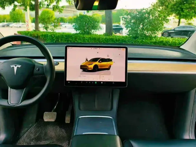 Tesla Model Y — Фото автомобиля 9