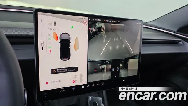 Tesla Model 3 — Фото автомобиля 25