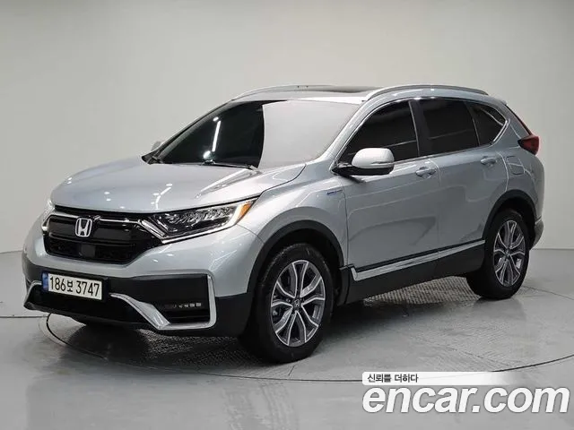 Фотография автомобиля — Honda CR-V CR-V 5-е поколение 2.0 гибрид Touring 4WD