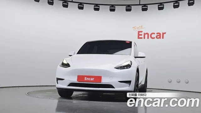 Tesla Model Y — Фото автомобиля 3