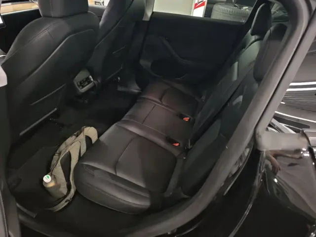 Tesla Model Y — Фото автомобиля 16