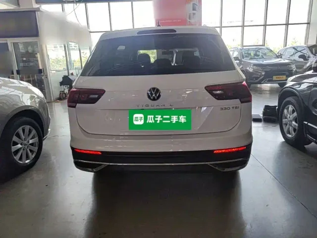 Volkswagen Tiguan L — Фото автомобиля 5