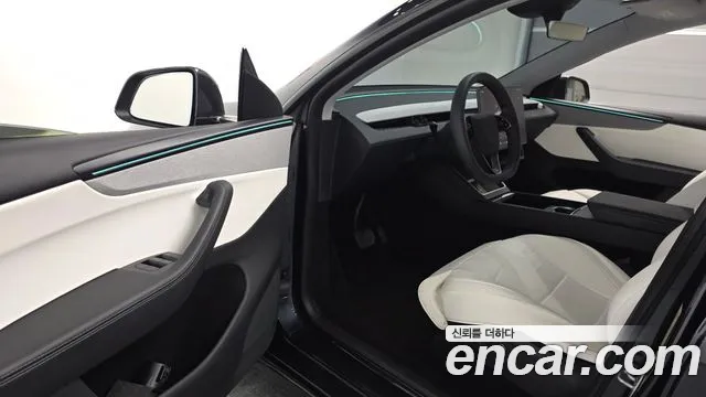 Tesla Model Y — Фото автомобиля 10