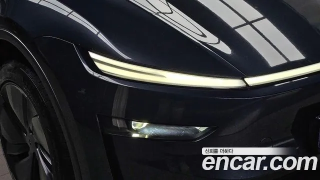 Tesla Model Y — Фото автомобиля 7