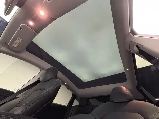 Tesla Model Y — Фото автомобиля 12