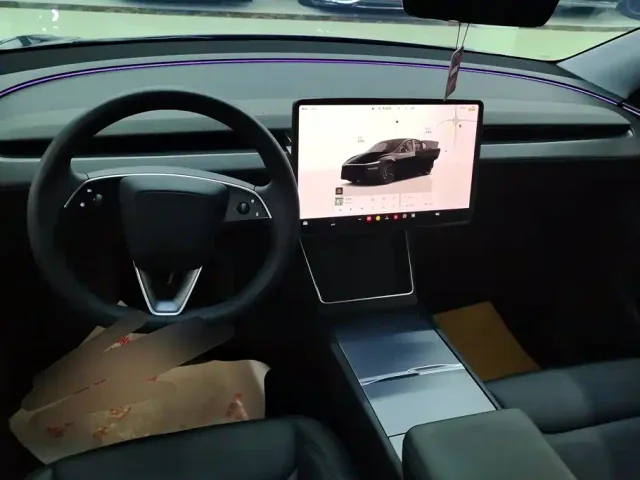 Tesla Model Y — Фото автомобиля 12