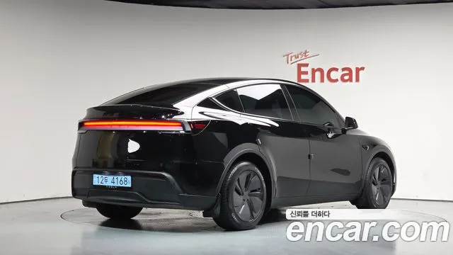 Tesla Model Y — Фото автомобиля 2