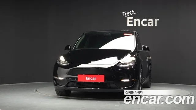Tesla Model Y — Фото автомобиля 3