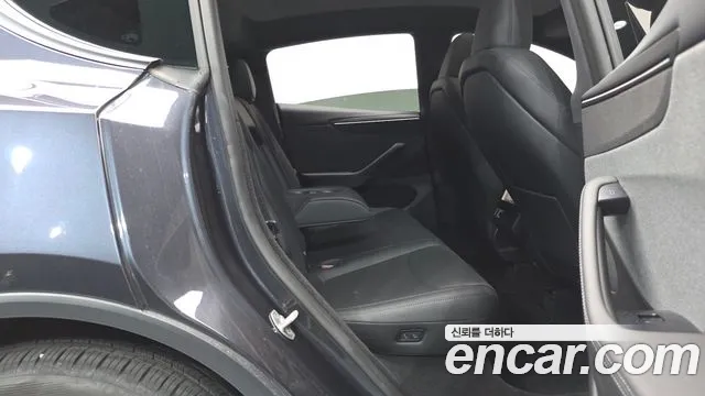 Tesla Model Y — Фото автомобиля 10