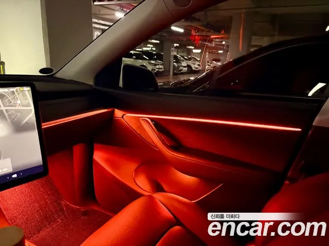 Tesla Model Y — Фото автомобиля 13