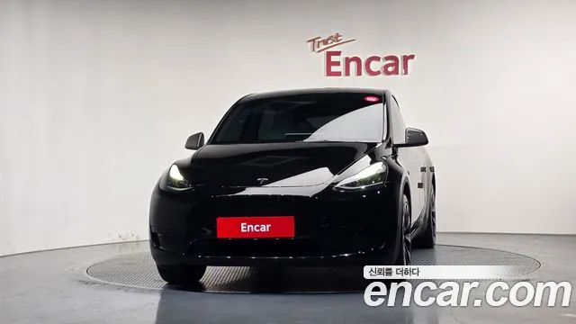 Tesla Model Y — Фото автомобиля 3