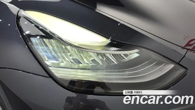 Tesla Model Y — Фото автомобиля 6