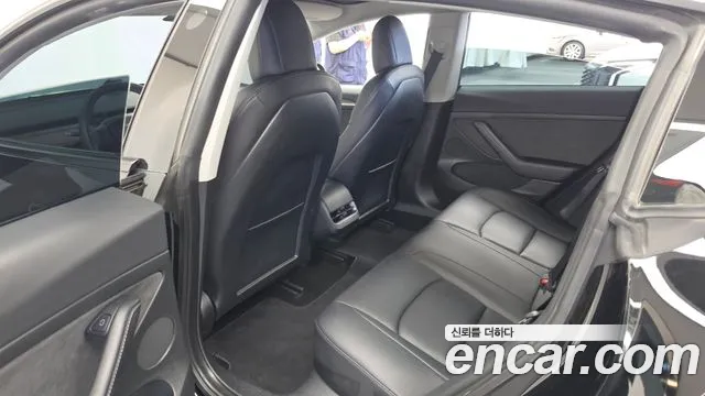Tesla Model 3 — Фото автомобиля 16