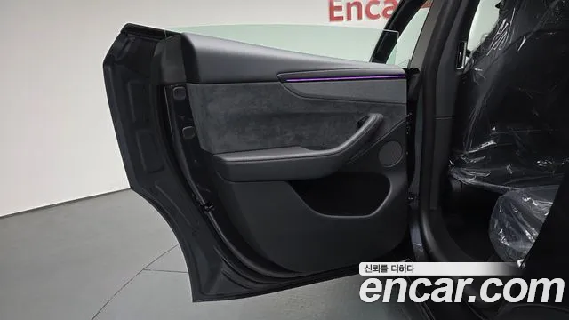 Tesla Model Y — Фото автомобиля 14
