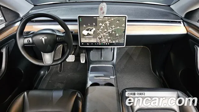 Tesla Model Y — Фото автомобиля 7