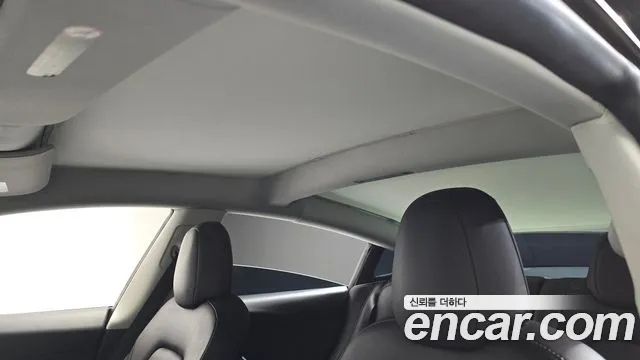 Tesla Model 3 — Фото автомобиля 21