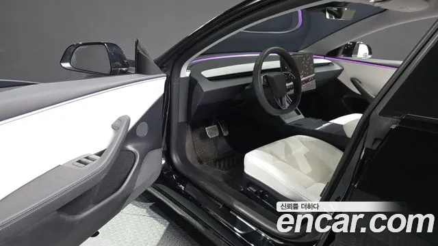 Tesla Model 3 — Фото автомобиля 15