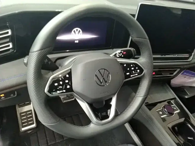 Volkswagen Tiguan L — Фото автомобиля 10