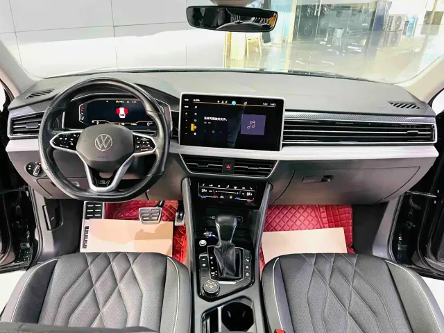Volkswagen Tiguan L — Фото автомобиля 9