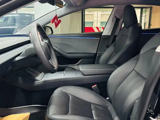 Tesla Model 3 — Фото автомобиля 7