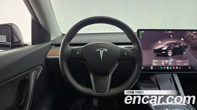 Tesla Model Y — Фото автомобиля 19