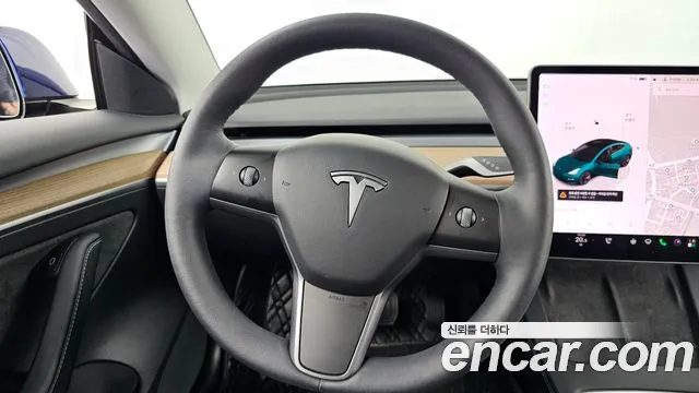 Tesla Model 3 — Фото автомобиля 10